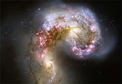 Столкновение галактик – это соитие и роды